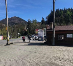 Parking lot in Ostravice - behind the brown shed