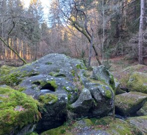 Boulders washed away by a stream of water