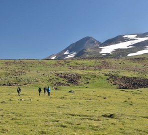 We start our ascent off the trail in the meadows