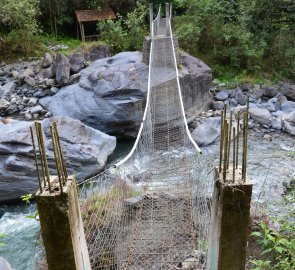 Suspension bridge towards the waterfall