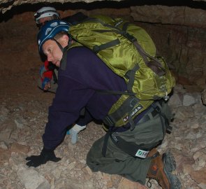 The beginning of the ferrata leads through a low tunnel from World War I.