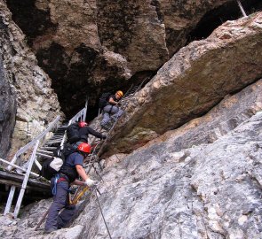 We enter the tunnel by ladders