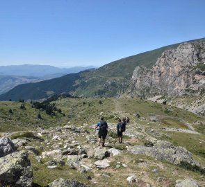 Descent from the mountain through meadows