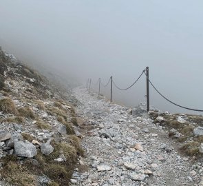 Descent from the plateau in the clouds