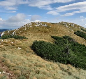 The grassy ridge offers beautiful views