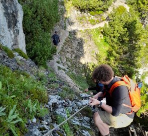 Slightly challenging place during the ascent secured by a rope